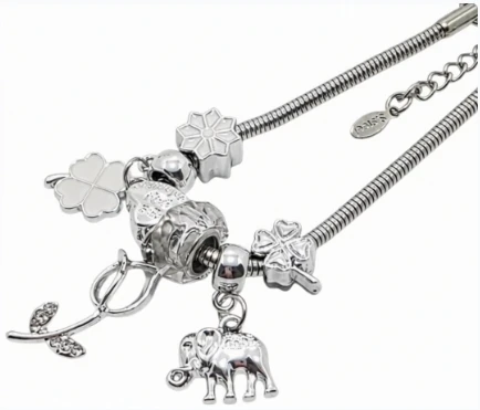 Pulsera de acero quirurgico con dije fantasia 18cm + 4cm